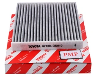 Close-up of a clean car air filter, essential for engine performance and air quality.